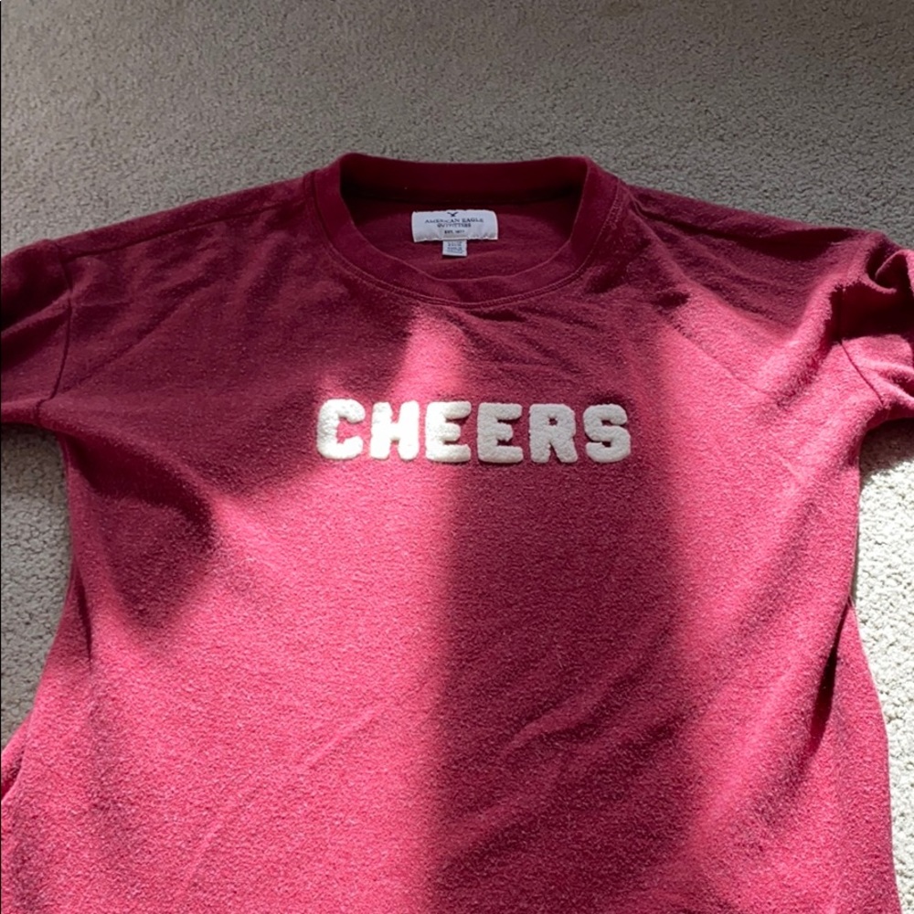 Dark red “cheers” American Eagle Crew Neck